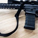 CAT-Outdoors-Sling-with-gun_1920x1080