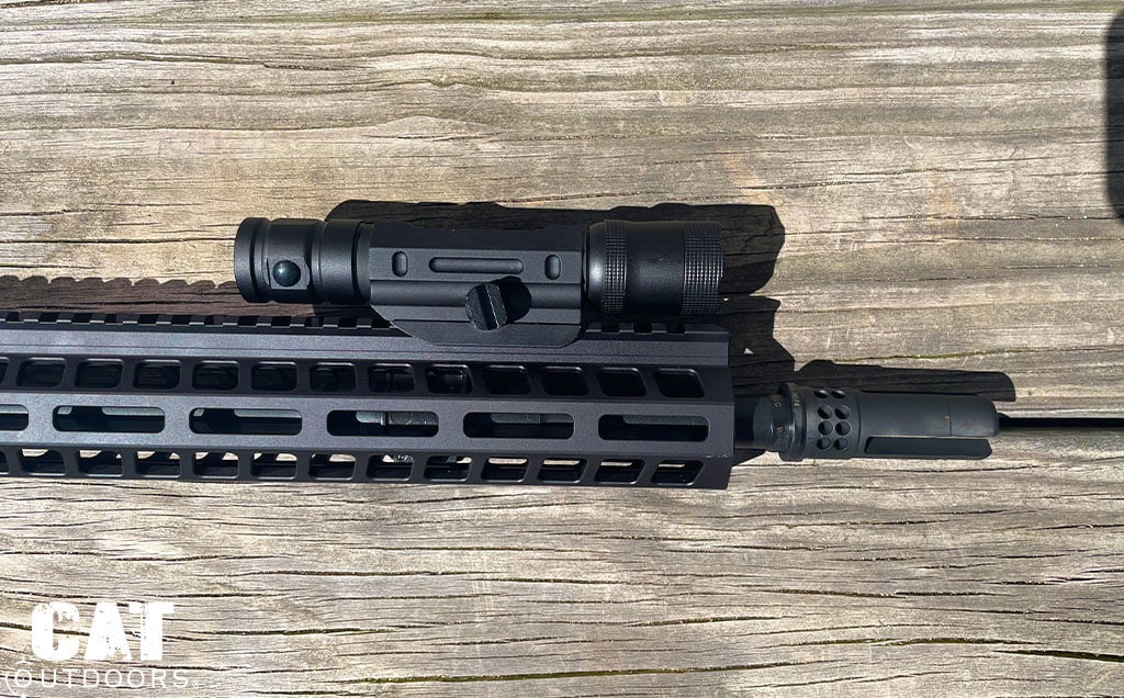 Weapon light mounted on AR-15 picatinny rail