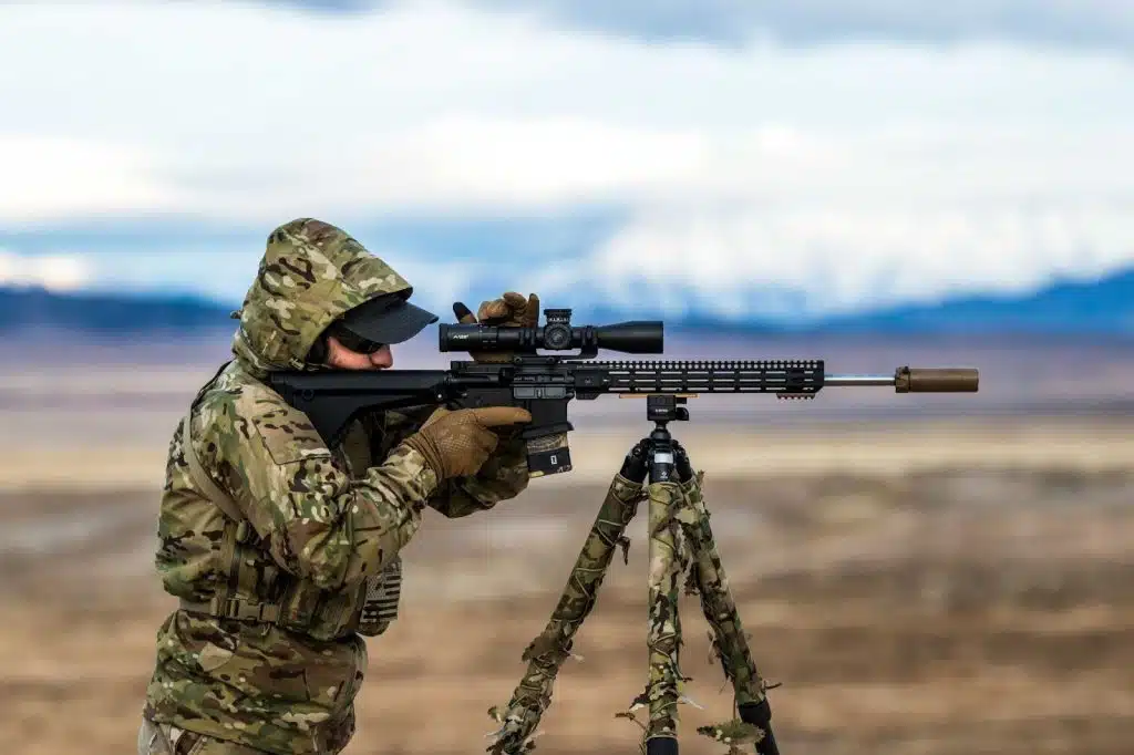 Man Long Ranging Shooting, looking through scope