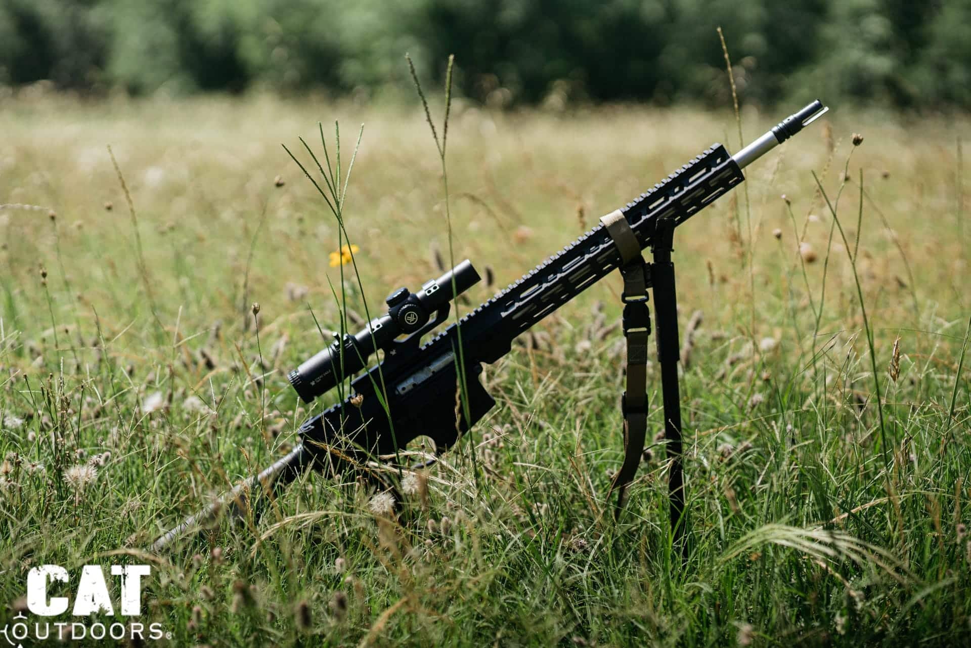Vortex Strike Eagle 1-8x24 SFP on a PSA Sabre-10 resting on a bipod in the grass