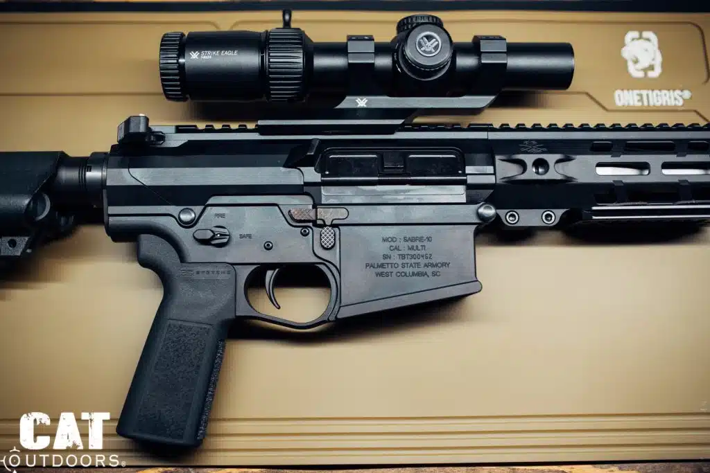 PSA Sabre-10 receivers and Vortex Strike Eagle scope in close-up on a tan mat