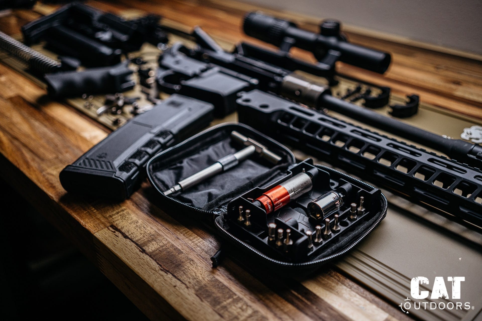 Fix It Sticks All-in-One Torque Driver Kit in case next to AR-15 parts