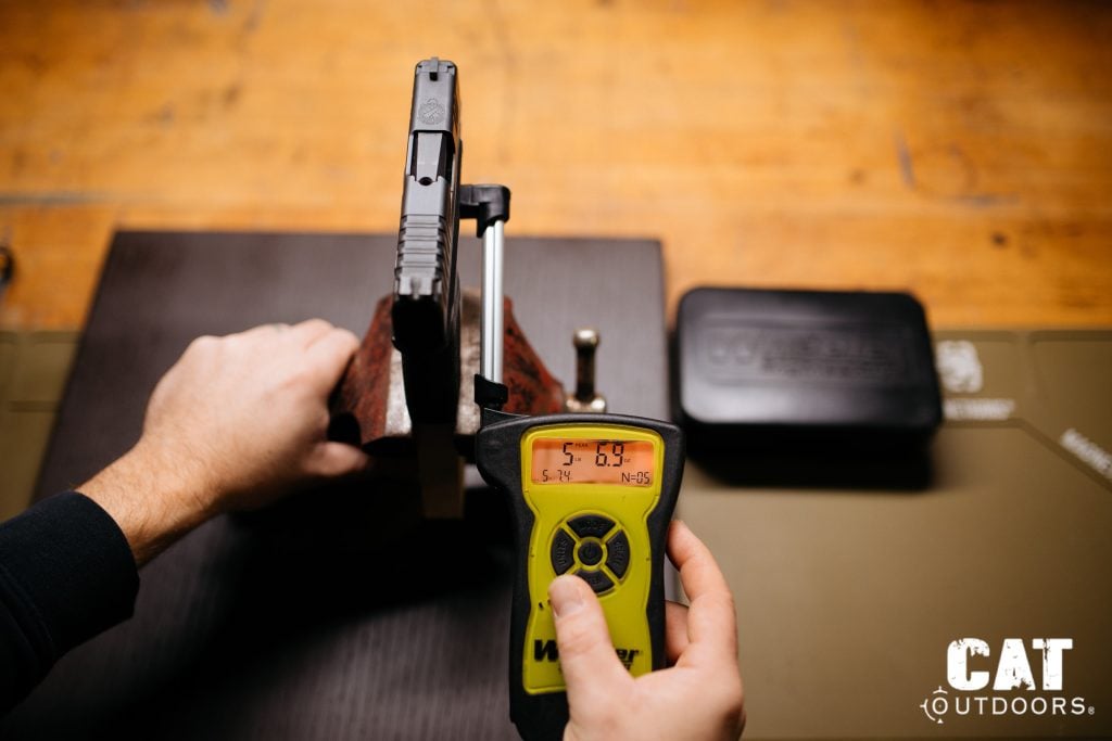 Wheeler digital trigger gauge measuring the Springfield Hellcat trigger pull at 5 pounds 6.9 ounces with a five-shot average of 5.74 pounds displayed
