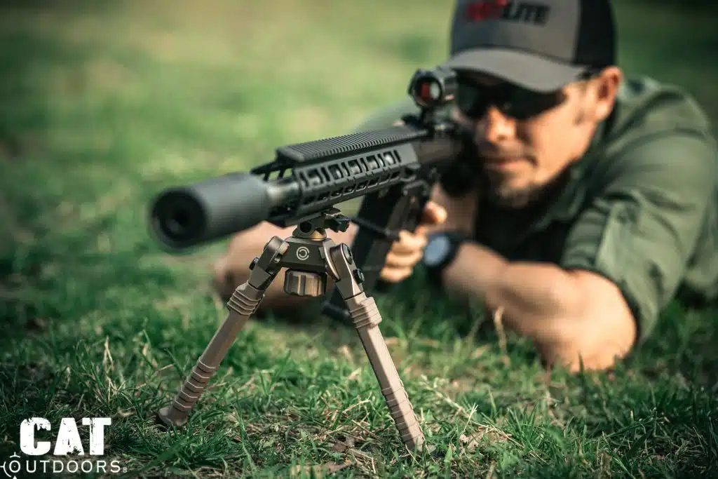 Front-on view of CVLIFE bipod in prone shooting position with locking knob prominent