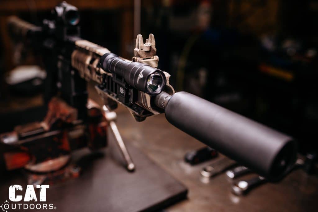 Light body rotated 90 degrees to deployed position on AR-15, showing the LPM pivot range