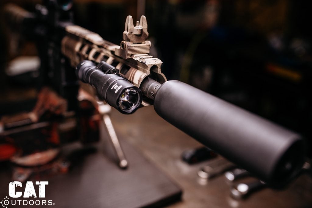 Same setup with light body rotated to stowed position parallel to handguard