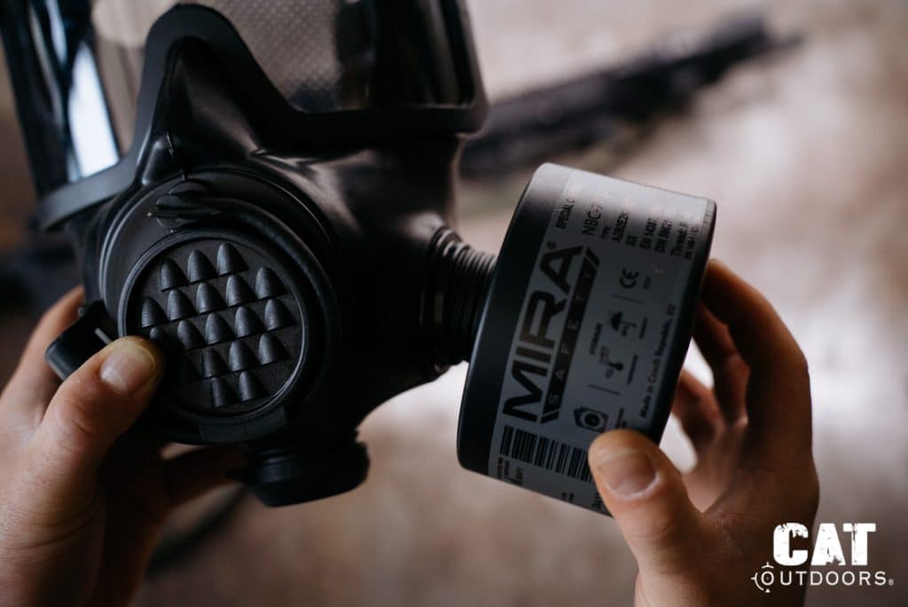 Threading the NBC-77 SOF filter onto the Mira Safety CM-8M side port