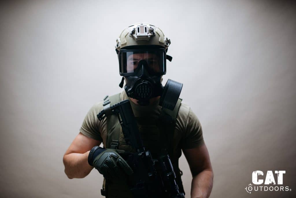Mira Safety CM-8M with single side-mounted filter and AR-15 at low ready