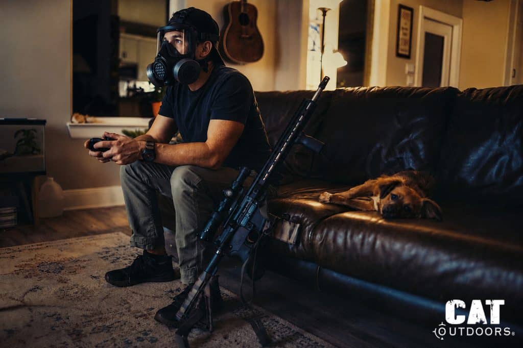 Playing video games on the couch while wearing the Mira Safety CM-8M