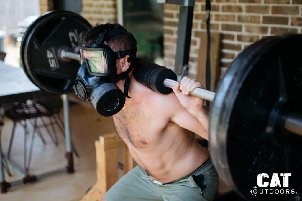 Barbell squats while wearing the Mira Safety CM-8M gas mask
