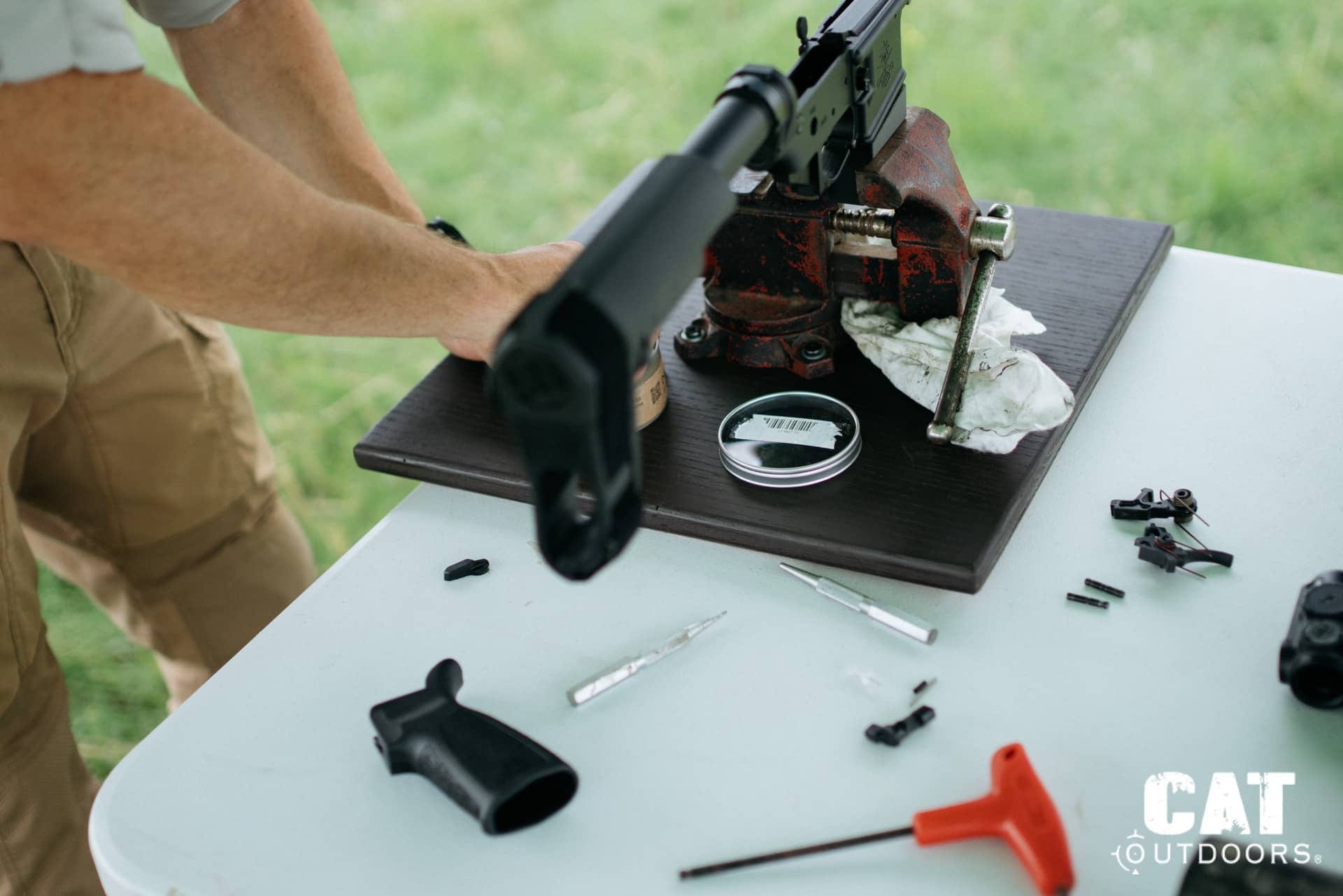LaRue trigger swap: pistol grip removed for spring access