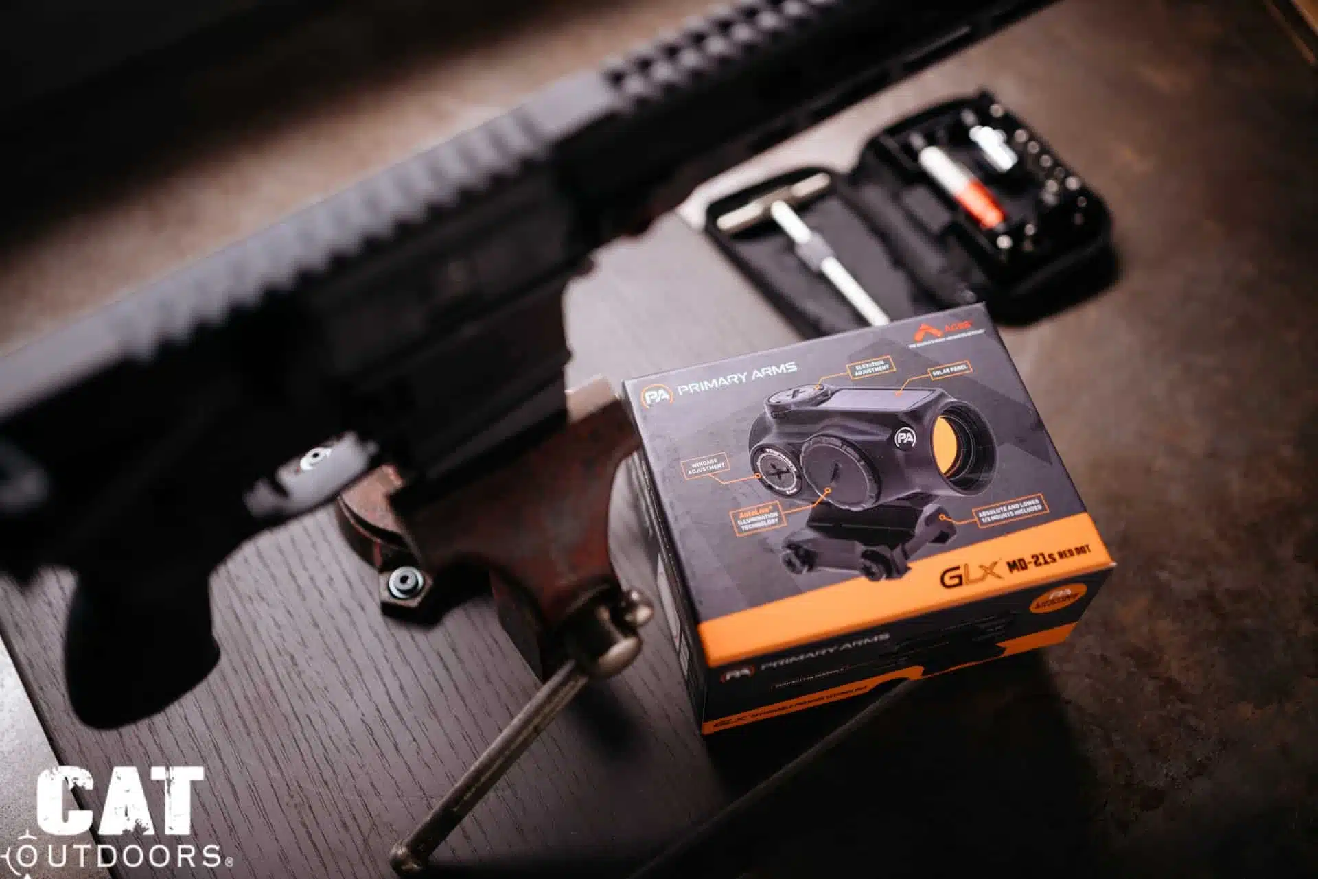Primary Arms GLx MD-21 box next to the PSA Sabre 300 Blackout during the build