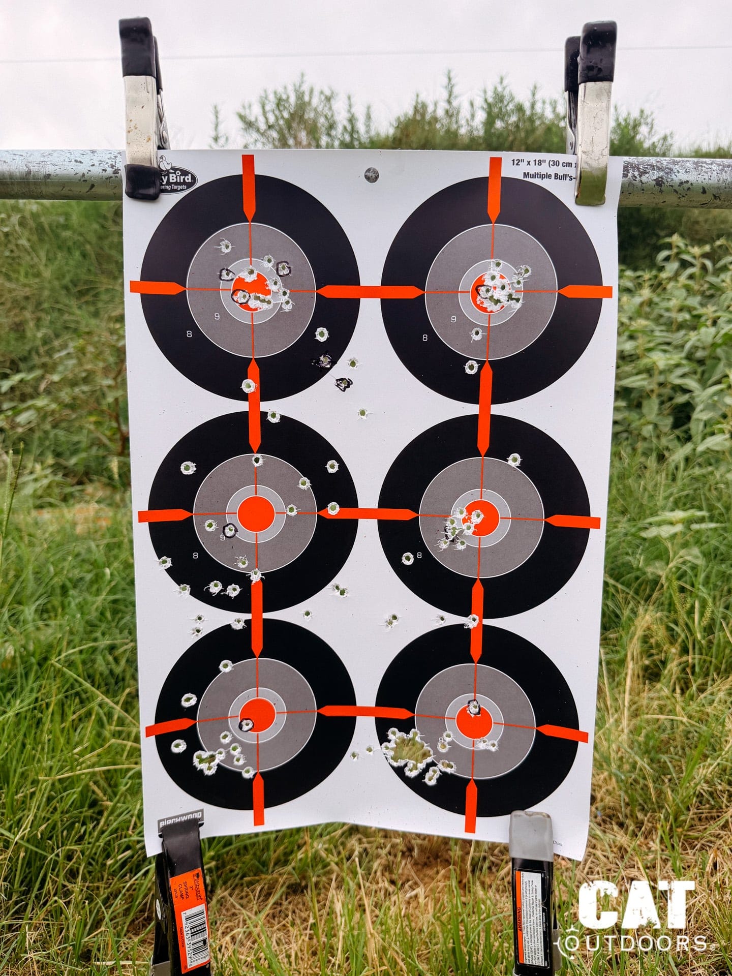 Shooter aiming the suppressed PSA Sabre with the GLx MD-21 reticle glow visible in the rear glass