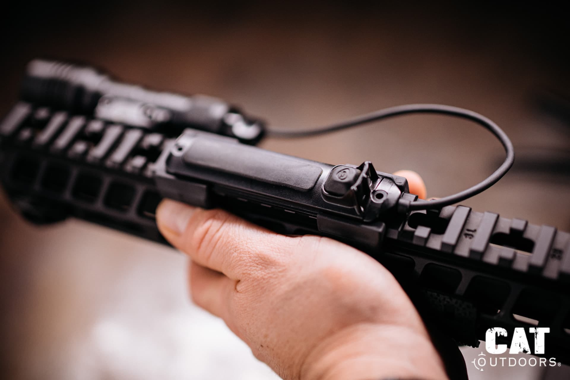 Grip position showing the ProTac Rail Mount 1 tapeswitch cable