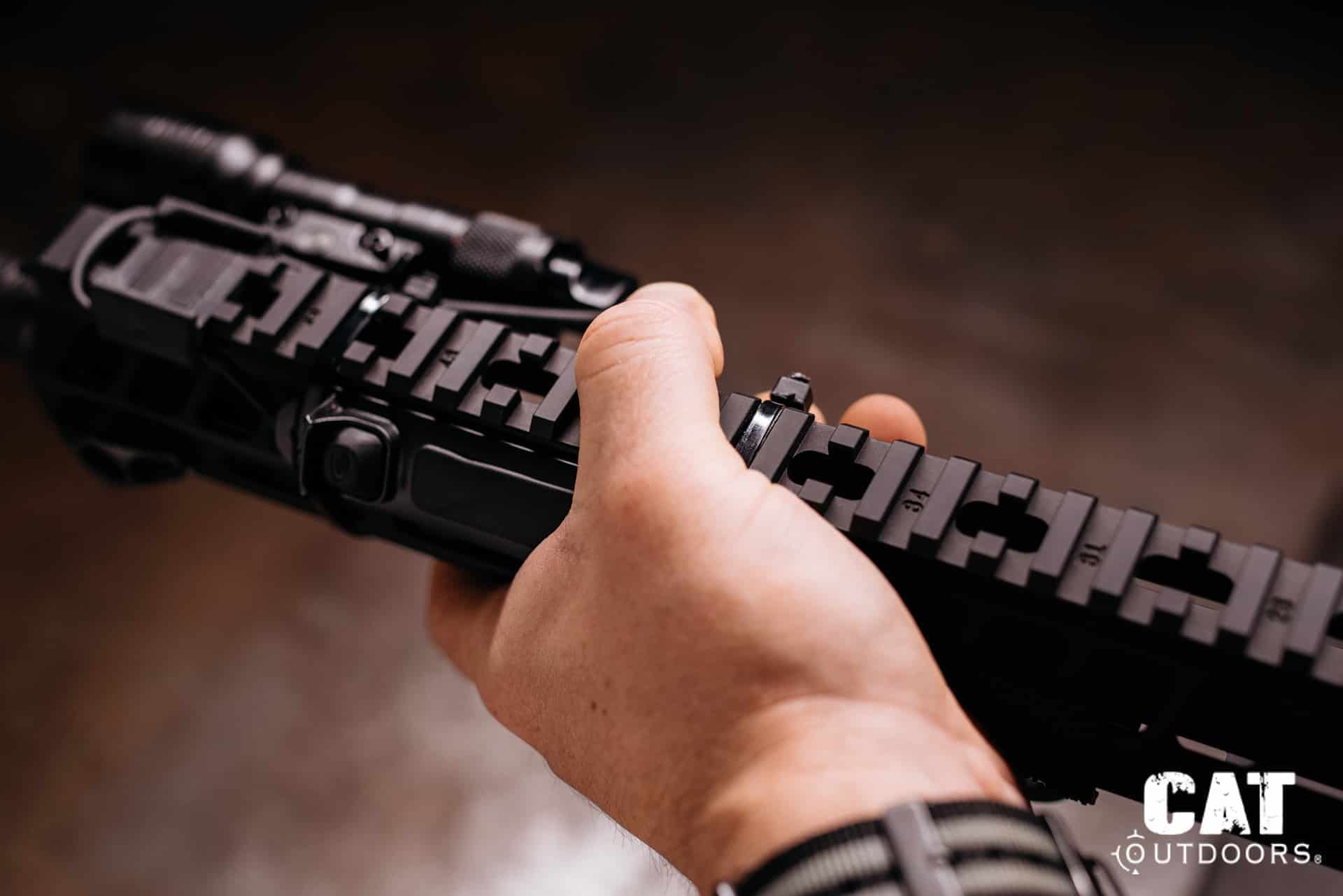 Hand on the grip running the ProTac tapeswitch at the ten o'clock position