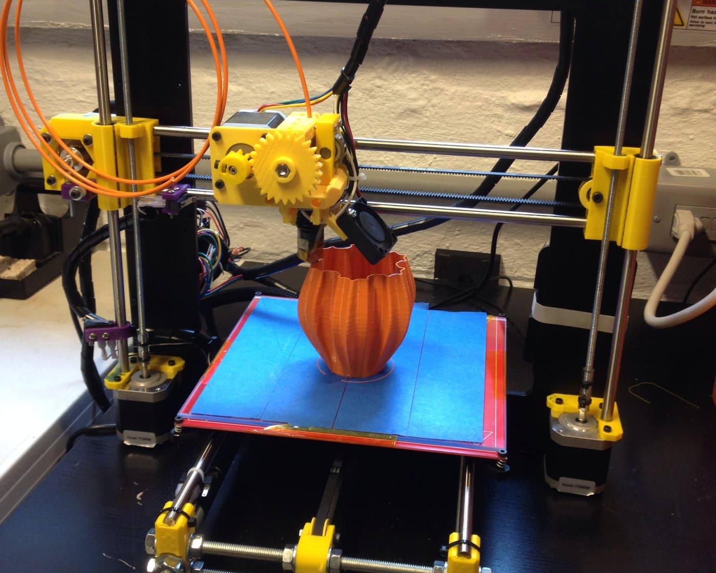 A Prusa i3 desktop 3D printer mid-print