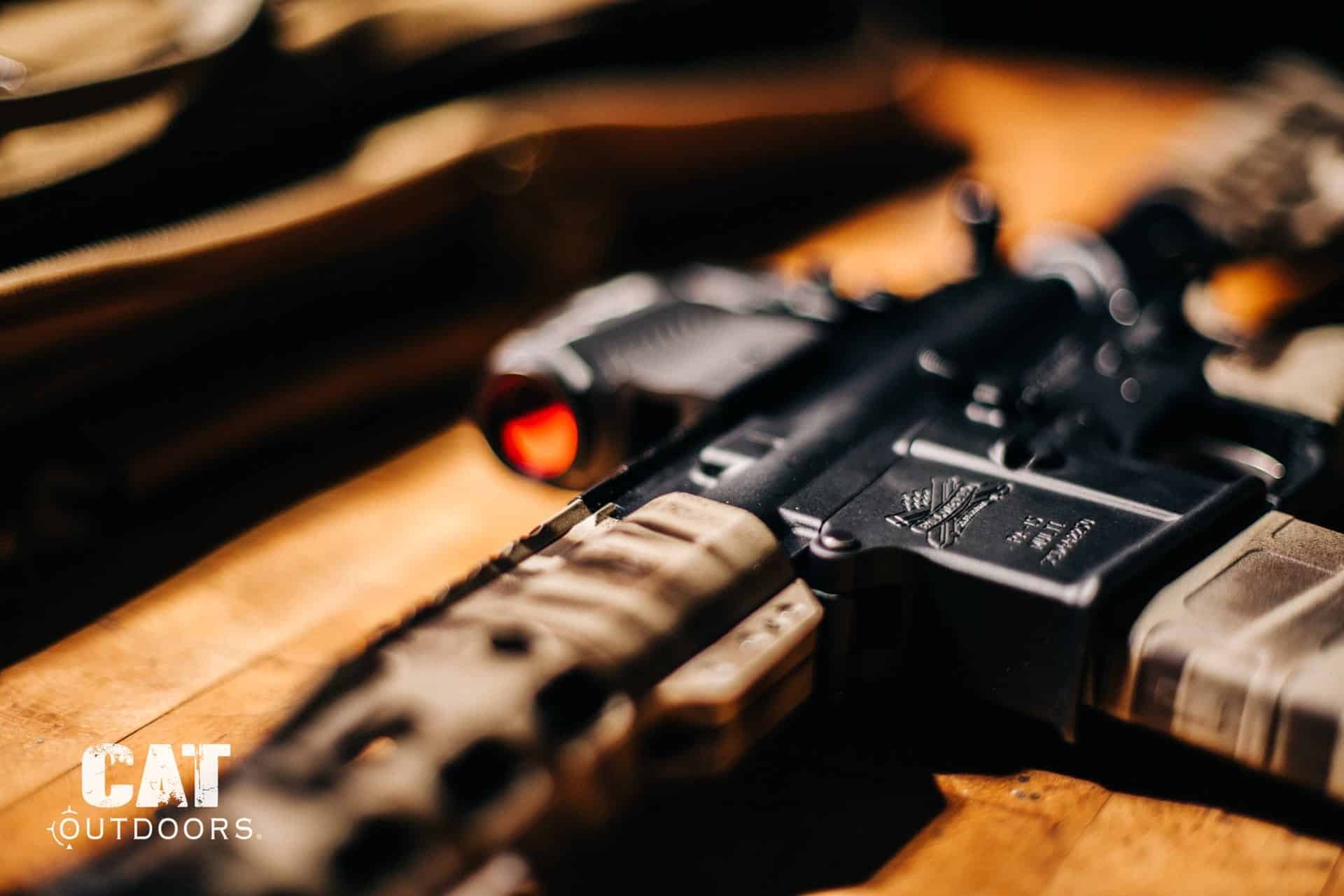 Close-up of a finished, serialized AR-15 lower receiver on a workbench