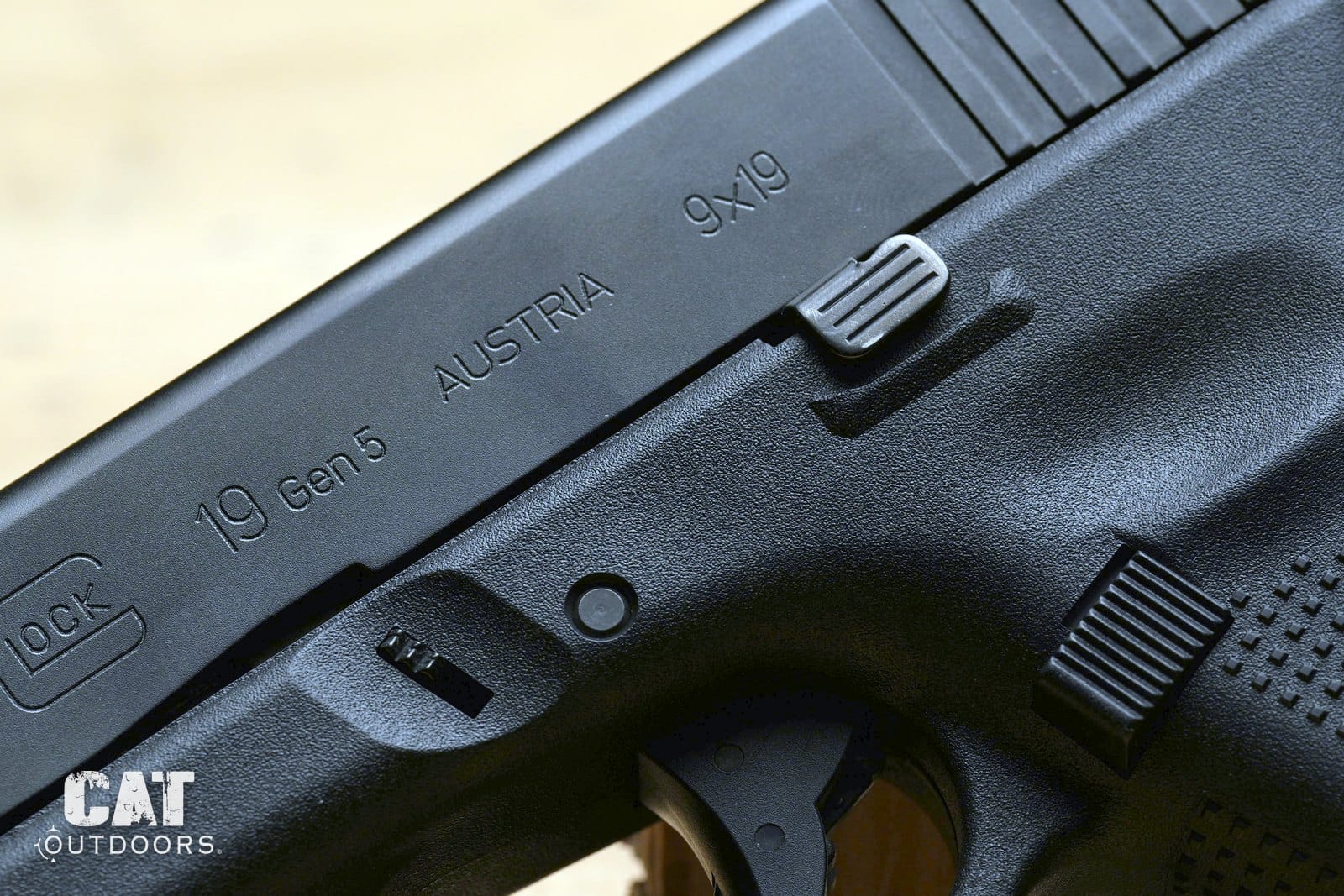 Macro of the Glock 19 Gen 5 slide marking reading 19 Gen5 Austria 9x19