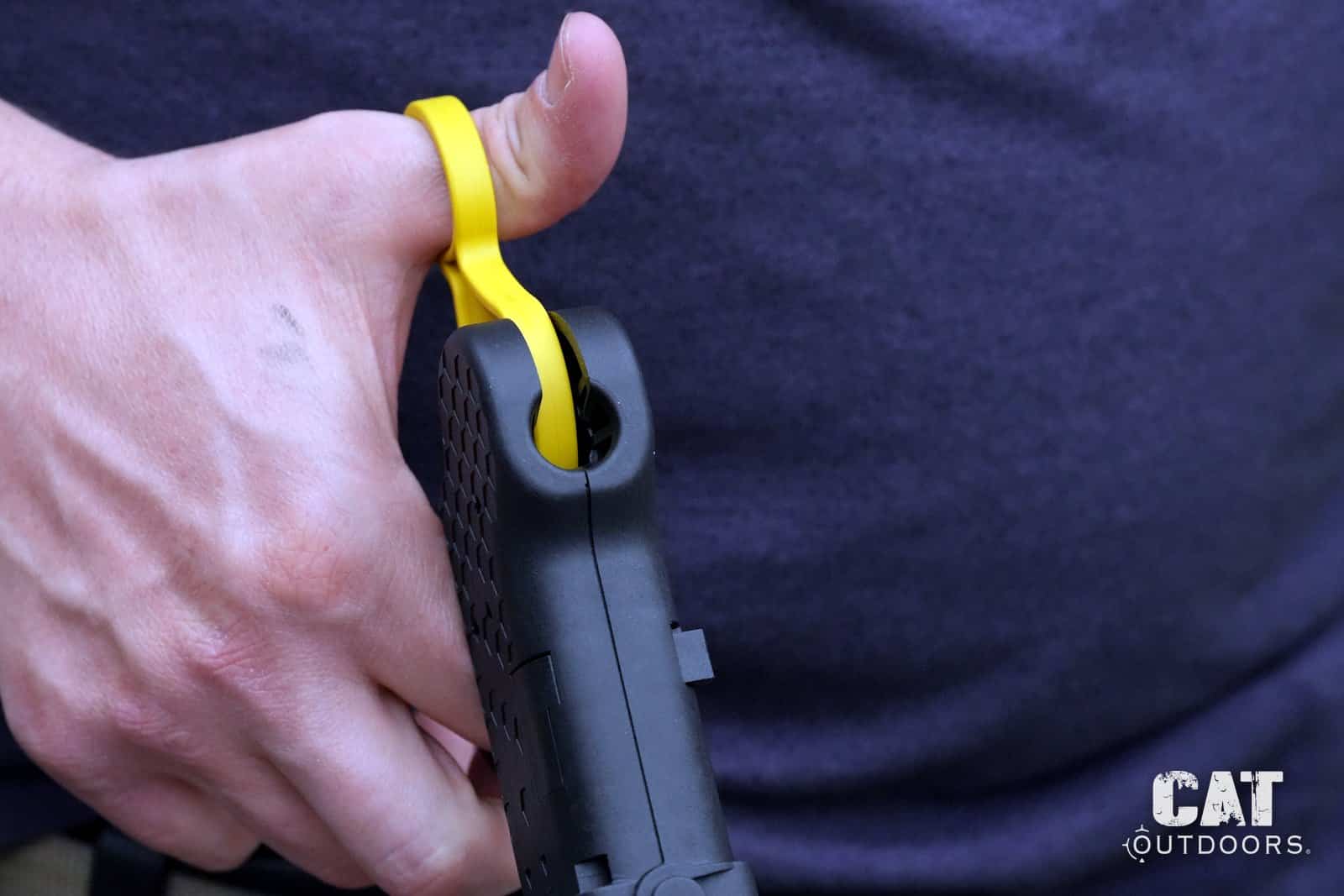 Thumb through the yellow ring of the Speed Beez loader, the flipped grip that worked better for us