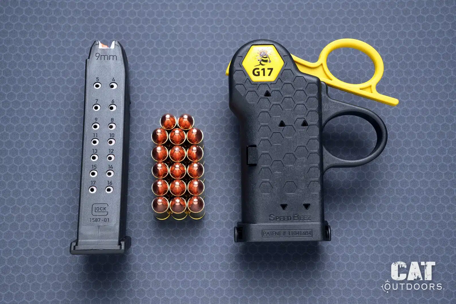 Glock factory 17-round magazine, 17 rounds of 9mm and the Speed Beez loader laid out for the timed test
