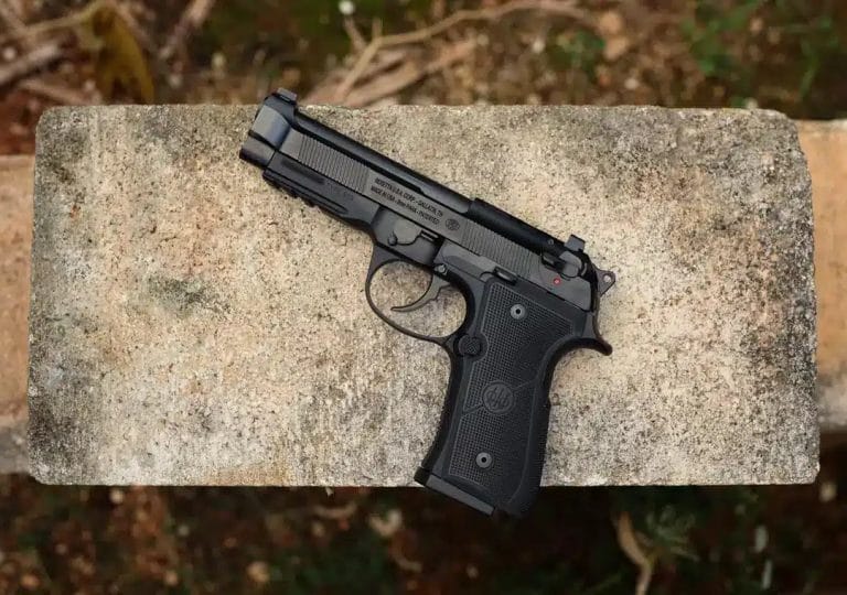 Beretta 92X RDO 9mm pistol on a stone block