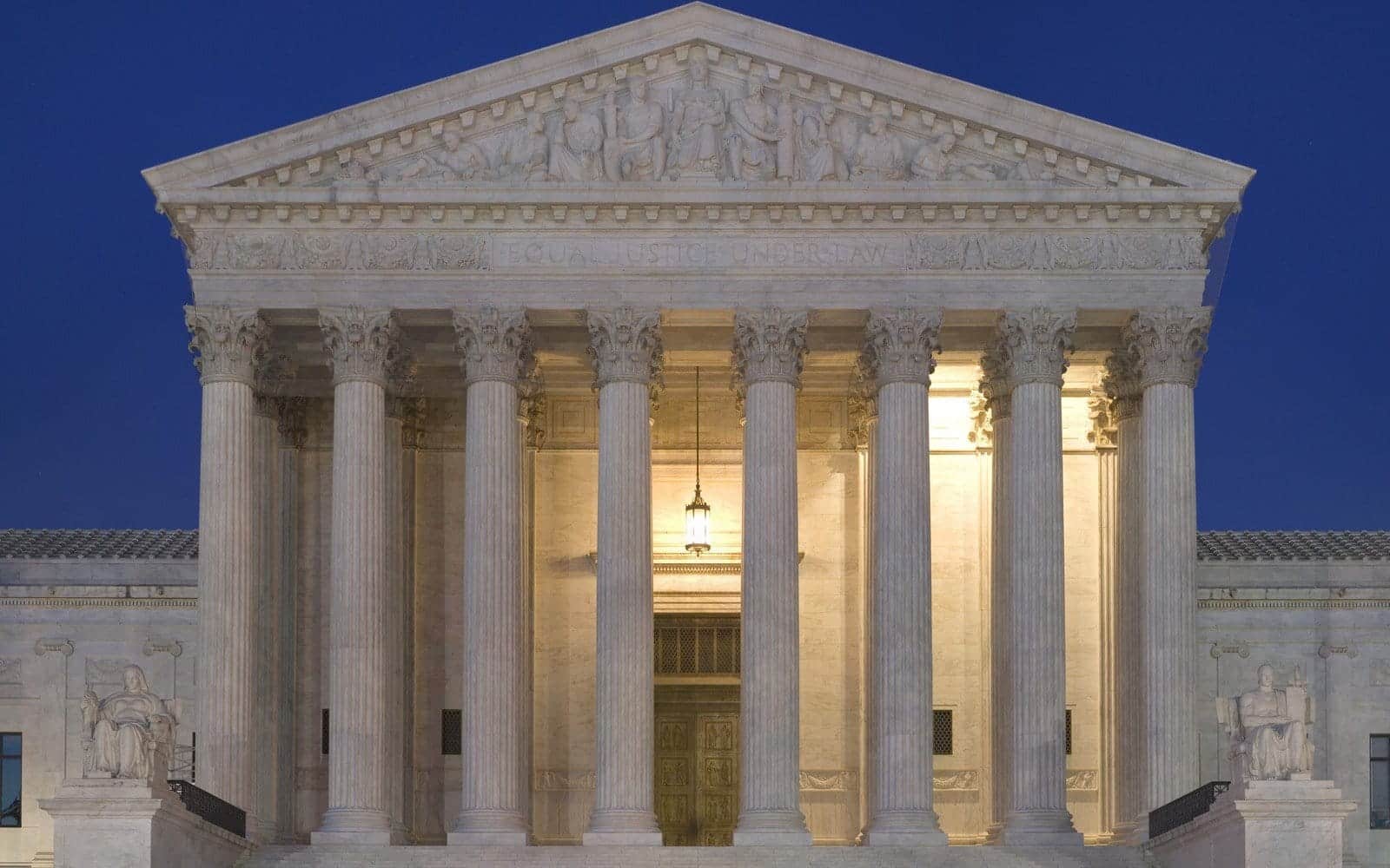 The U.S. Supreme Court building at dusk