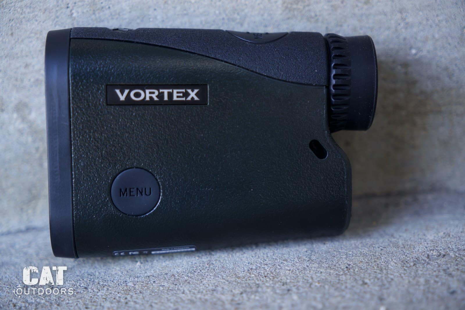 Vortex Crossfire HD 1400 rangefinder review: the 5x21 laser rangefinder on a concrete ledge