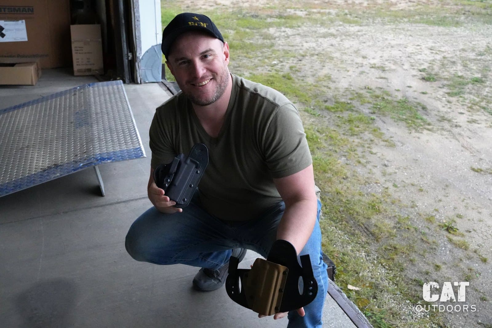 Justin Trump holding the Hidden Hybrid Single Clip and Double Clip holsters