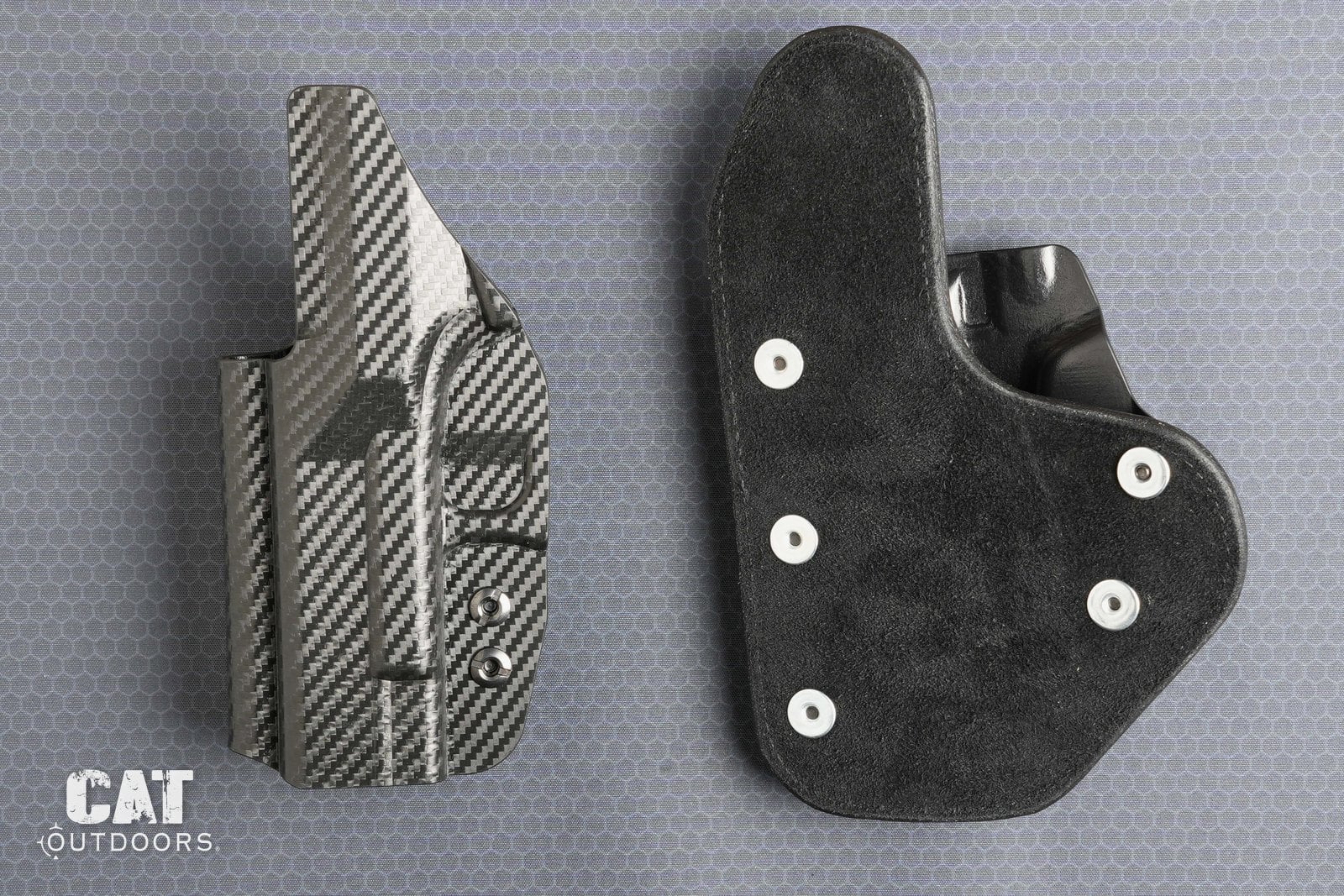 Backs of the Rounded Gear holster and the Hidden Hybrid holster, Kydex sweat guard next to leather
