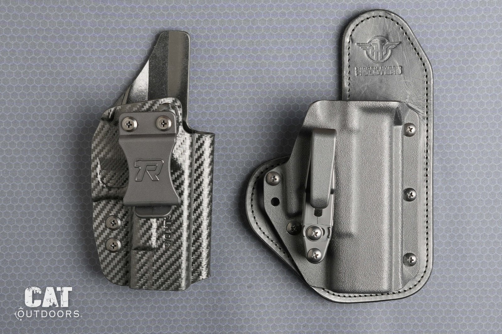 Rounded Gear Kydex holster next to the leather-backed Hidden Hybrid holster, fronts