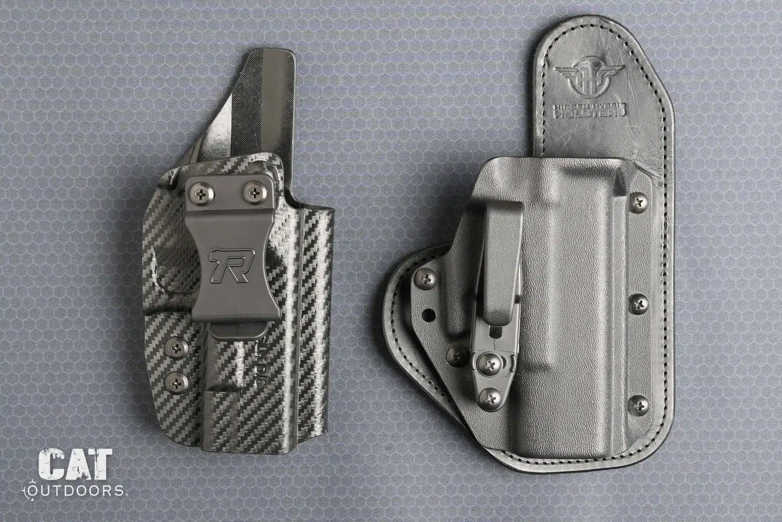Rounded Gear Kydex holster next to the leather-backed Hidden Hybrid holster, fronts