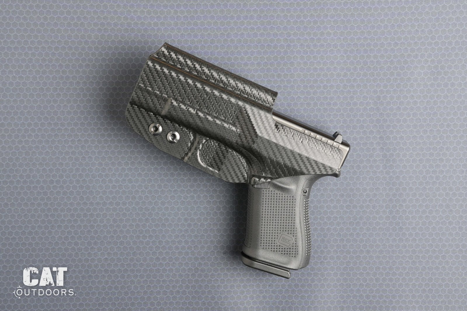 Body side of the Rounded Gear holster with the Glock 19 in it, showing the full-height sweat guard