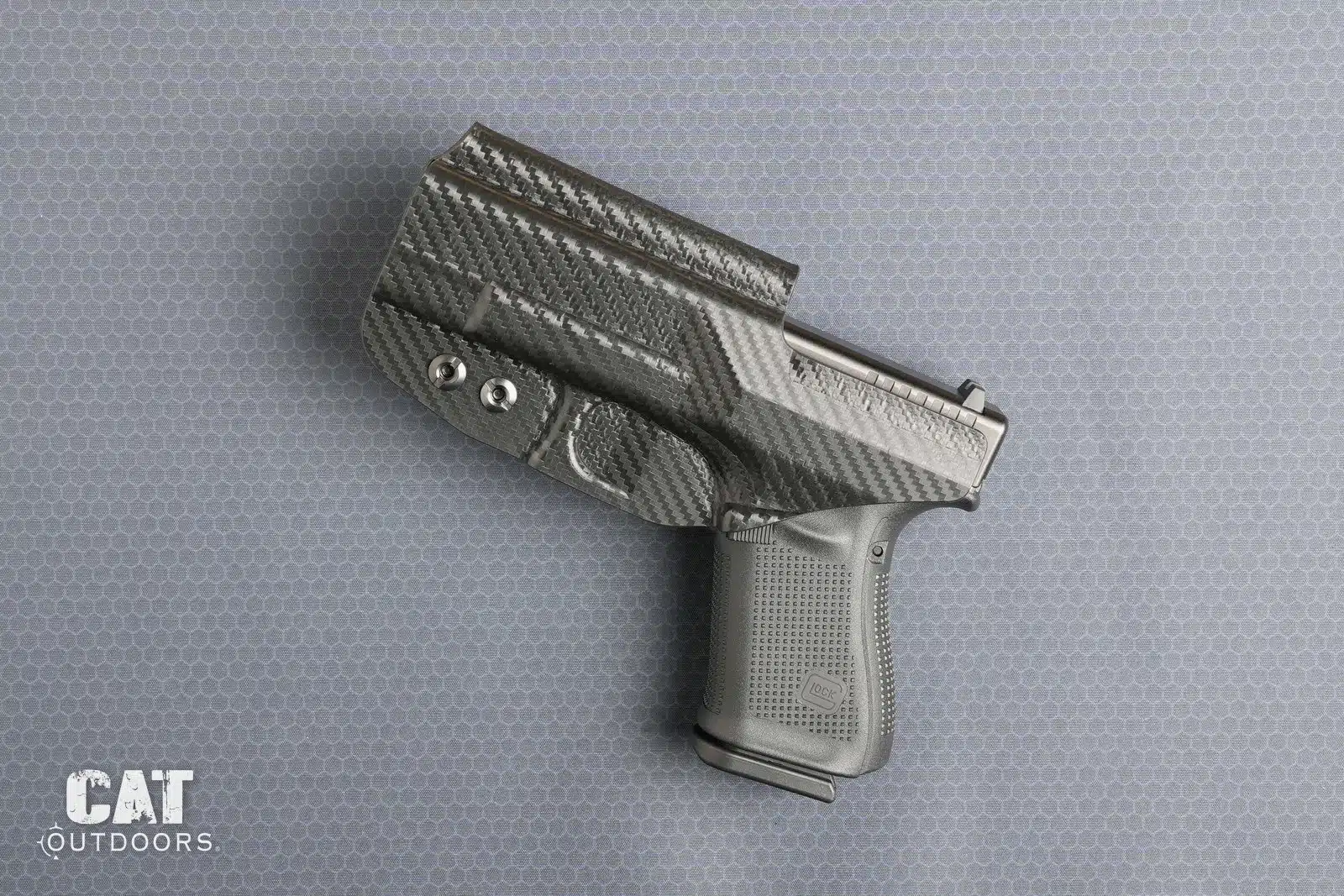 Body side of the Rounded Gear holster with the Glock 19 in it, showing the full-height sweat guard