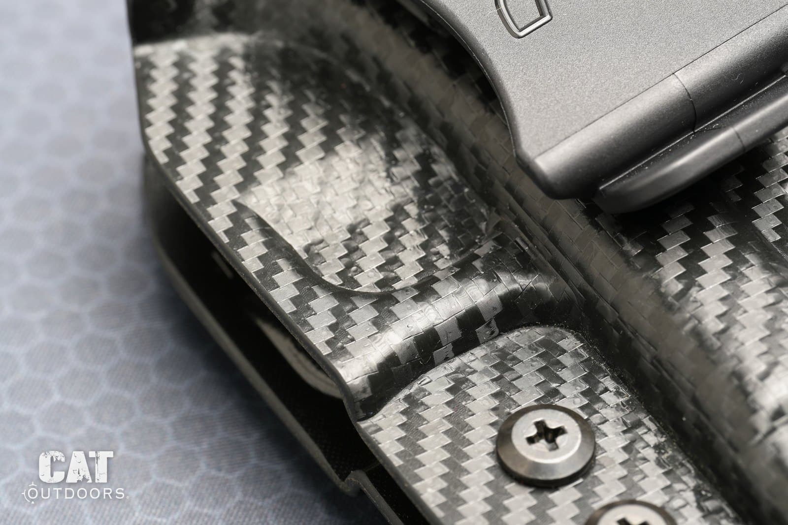 The molded dent around the trigger guard that makes the Rounded Gear holster click