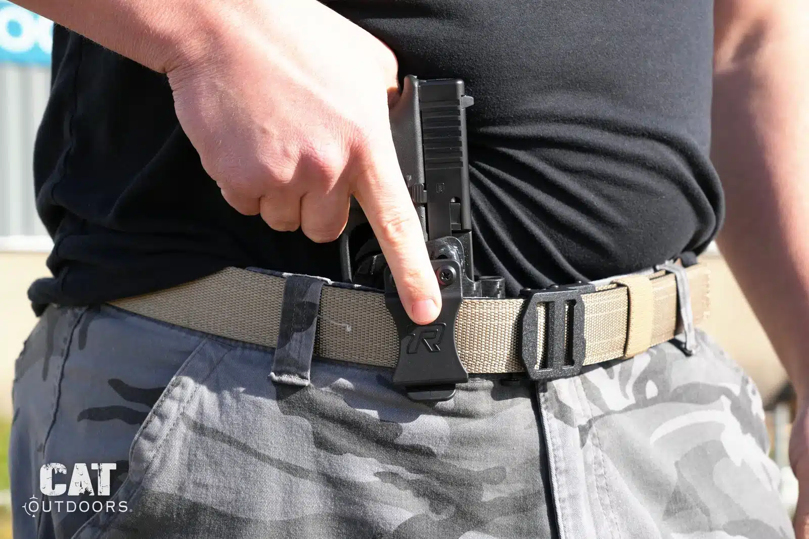 Drawing the Glock 19 from the Rounded Gear holster at appendix, thumb looking for the sweat guard