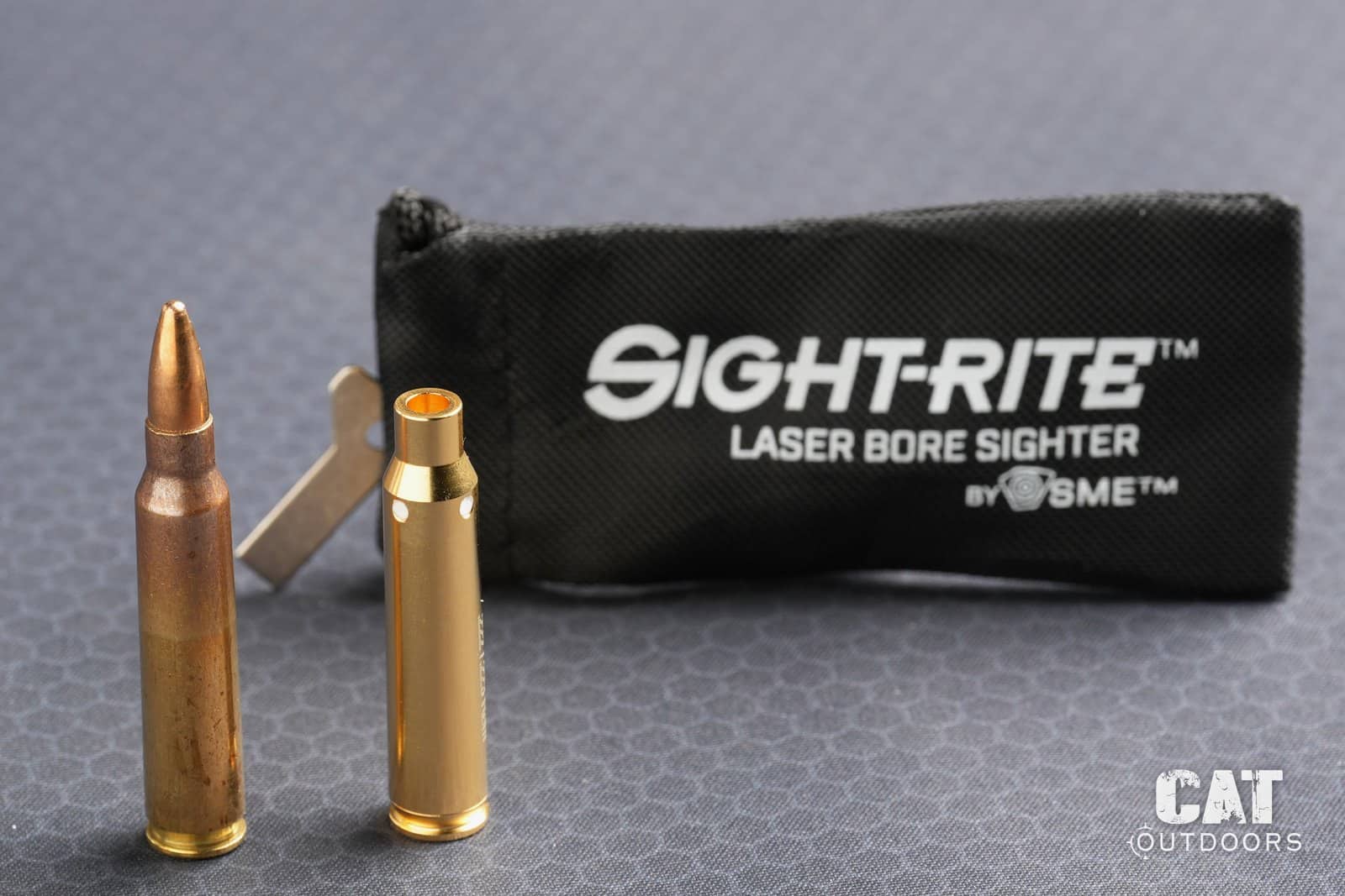 The Sight-Rite .223 laser bore sighter, the keyring switch tool and the pouch it ships in