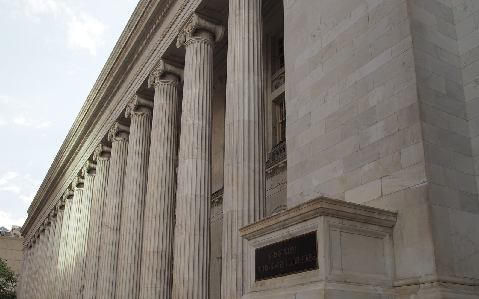 Columns and name plaque of the Byron White United States Courthouse in Denver, home of the Tenth Circuit