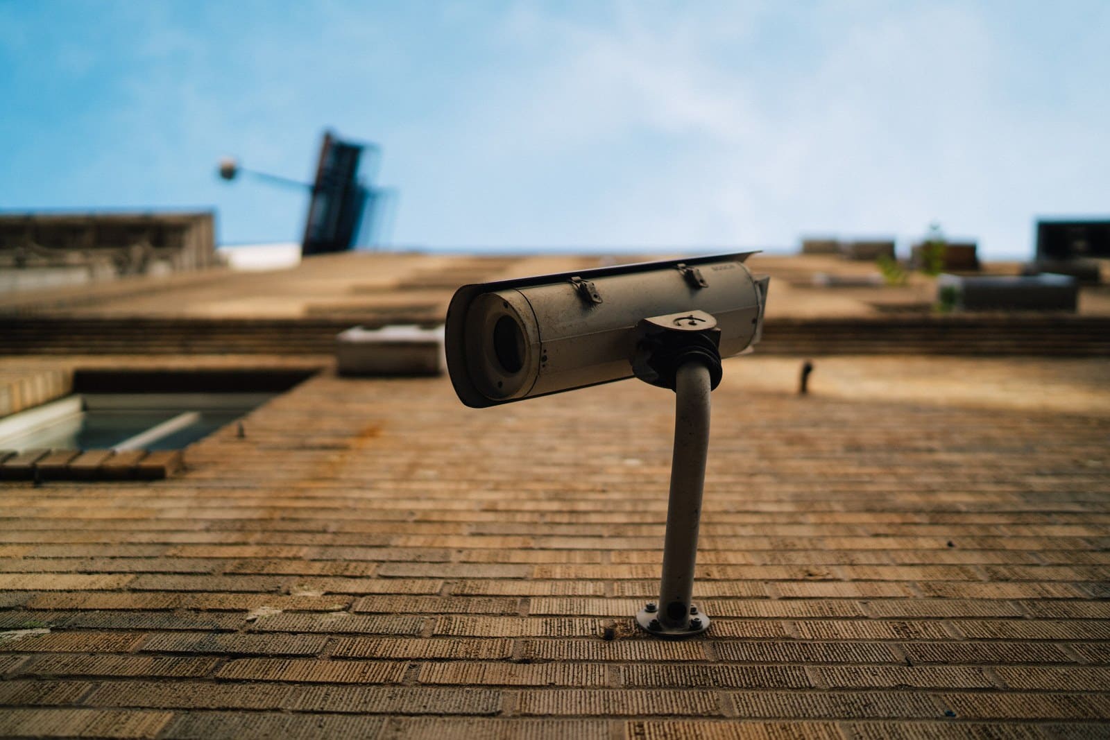A wall-mounted security camera